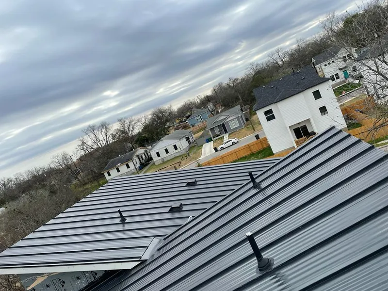 Standing seam metal roof panels with vents for Skylight Repair in Scotia